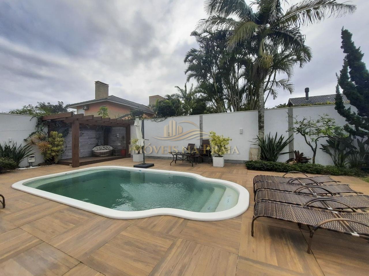 Foto 11 — Casa 5 dormitórios no bairro Atlântida