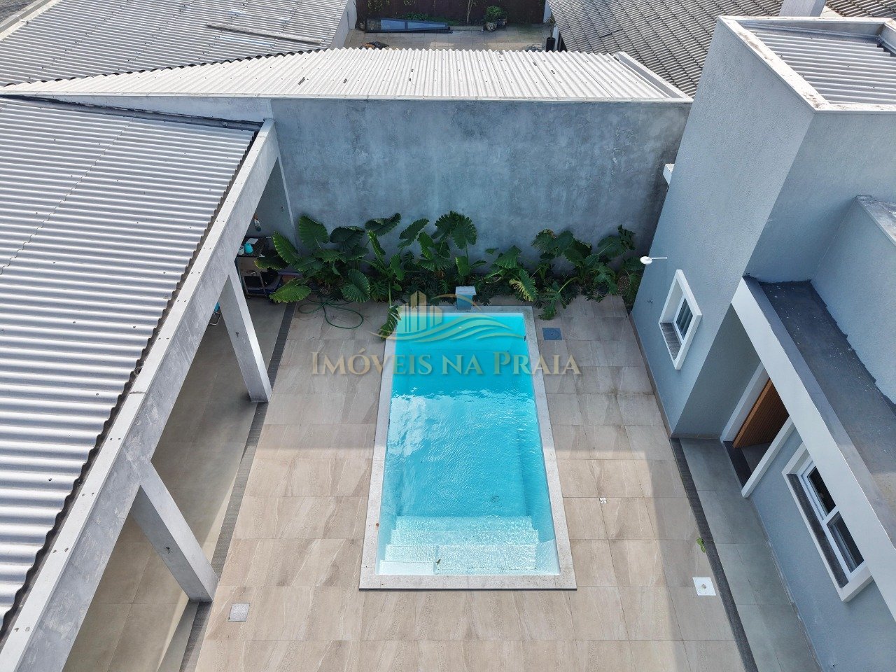 Foto 4 — Casa 4 dormitórios no bairro Atlântida