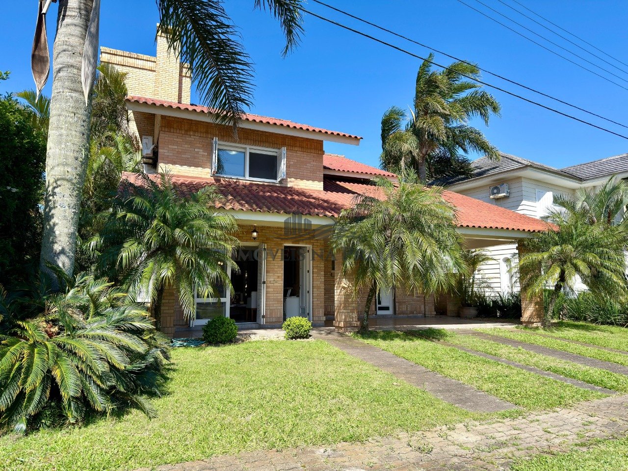 Casa em Condomínio 4 dormitórios no bairro Atlântida Lagos Park