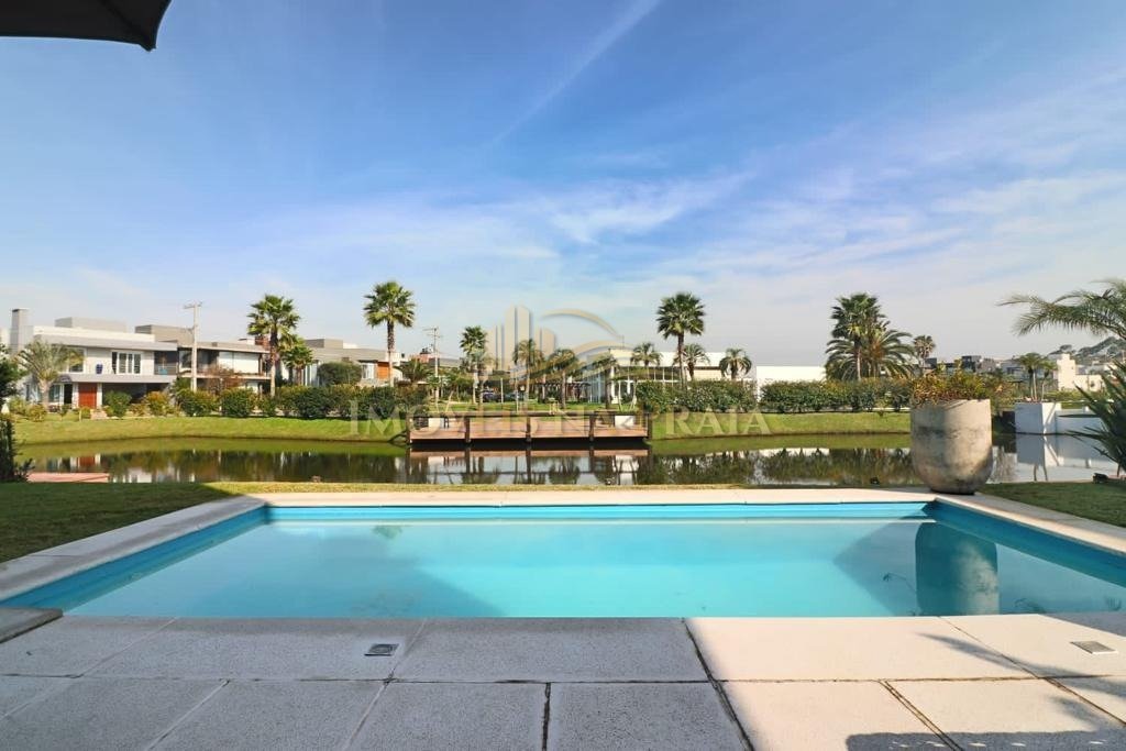 Foto 11 — Casa em Condomínio 4 Dormitório(s) Bairro Malibu B