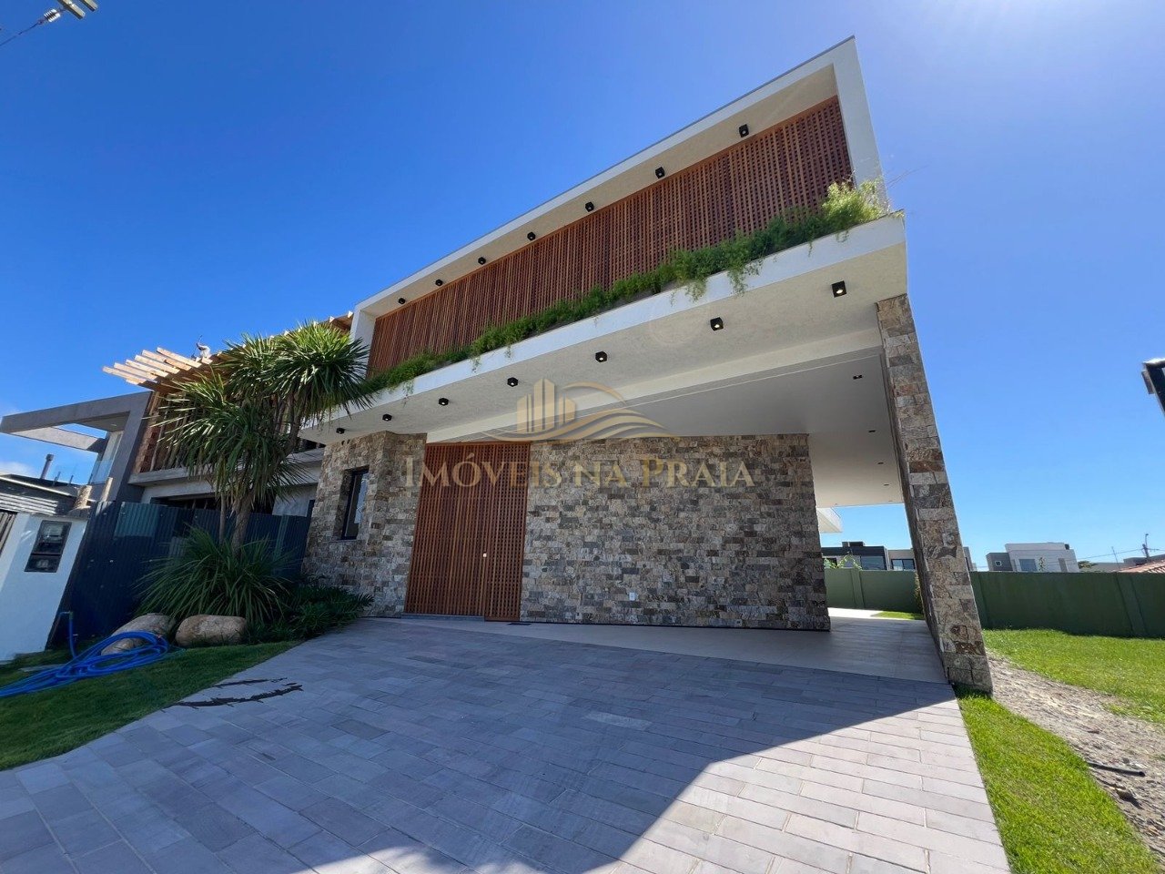 Foto 2 — Casa em Condomínio 4 Dormitório(s) Bairro Sunset