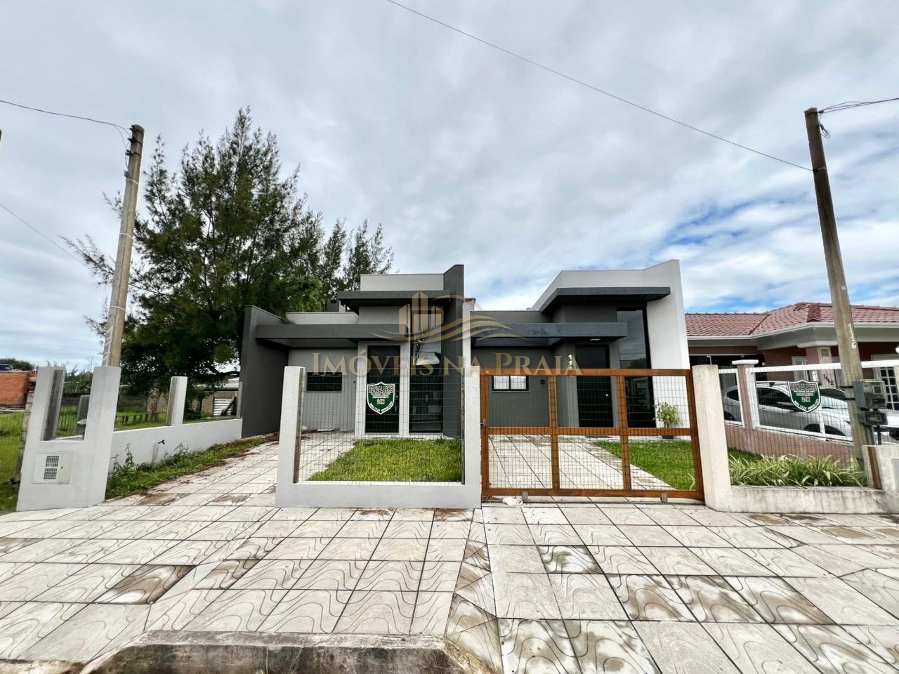 Foto 2 — Casa 3 dormitórios no bairro Rainha do Mar