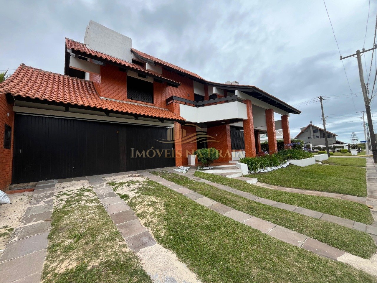 Foto 2 — Casa 5 dormitórios no bairro Atlântida