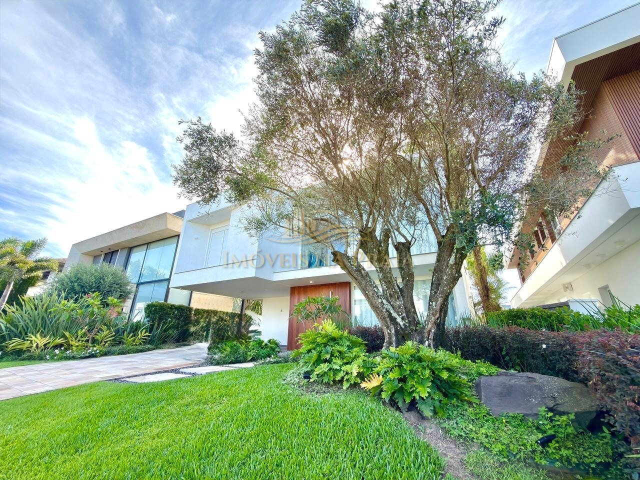 Foto 2 — Casa em Condomínio 5 dormitórios no bairro Enseada Lagos de Xangri-lá