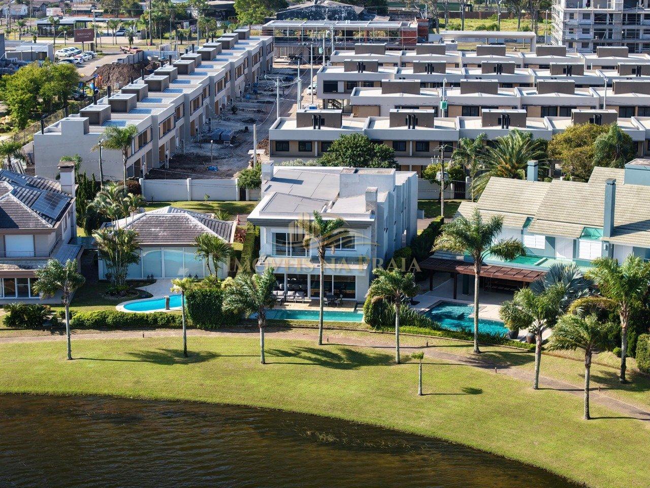 Foto 3 — Casa em Condomínio no Bosques de Atlântida.