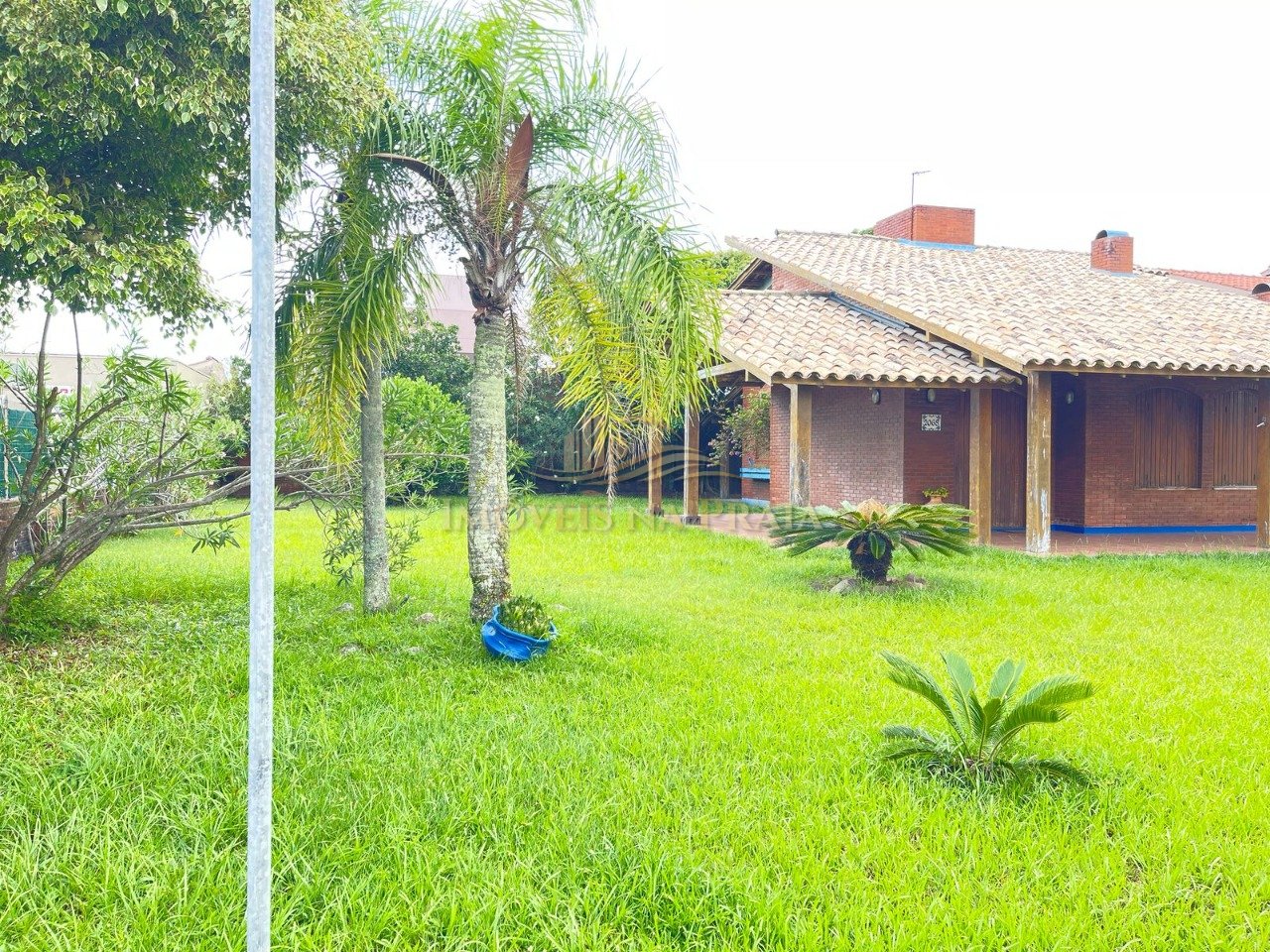 Foto 5 — Casa com 04 dormitórios no centro de Xangri-lá.