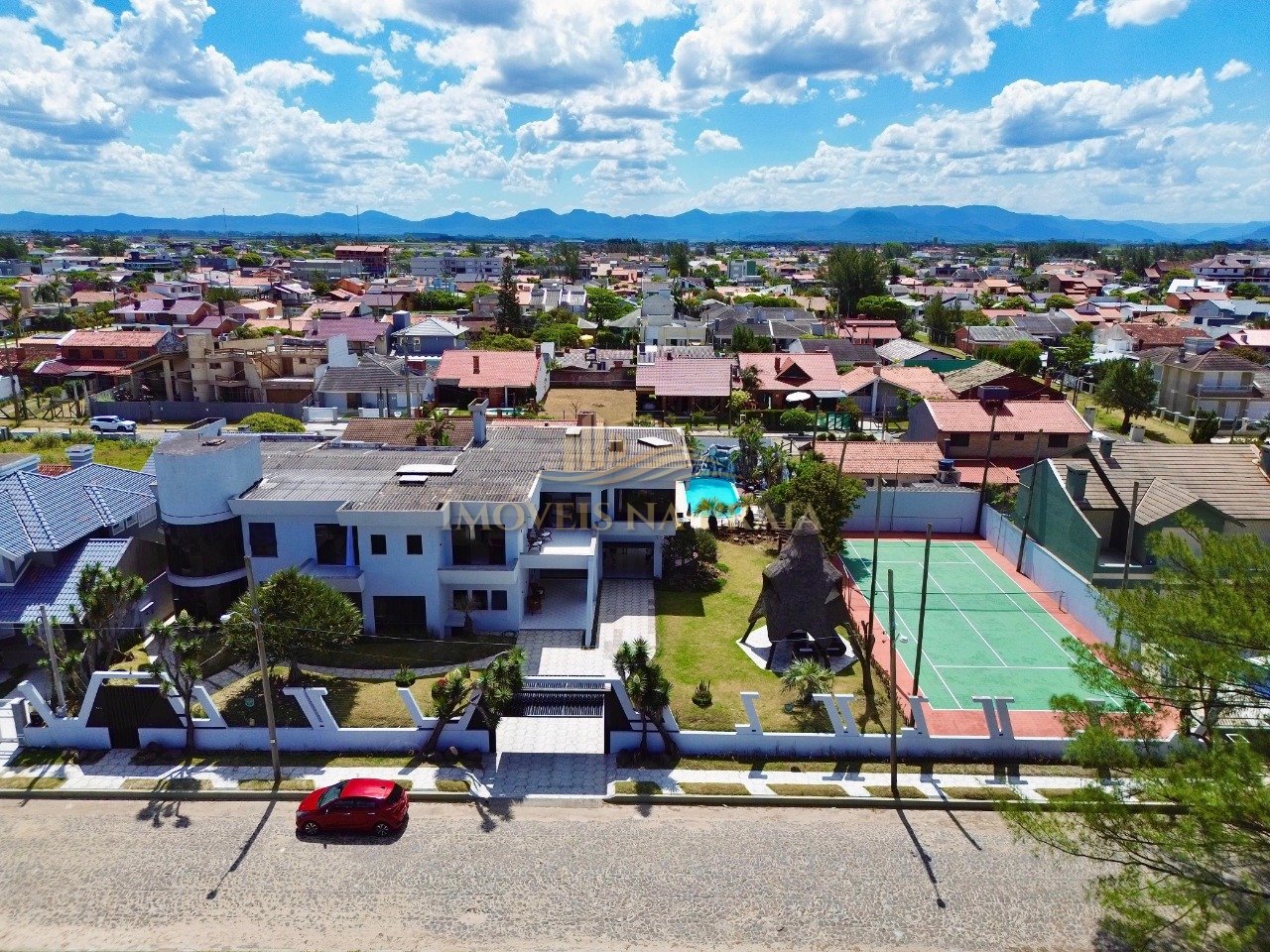 Foto 3 — Casa 5 dormitórios no bairro Noiva do Mar