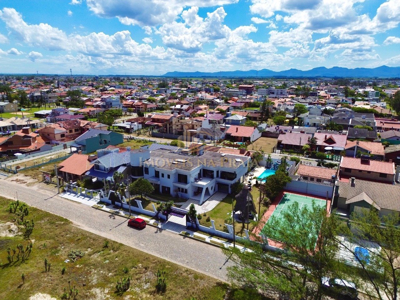 Foto 2 — Casa 5 dormitórios no bairro Noiva do Mar