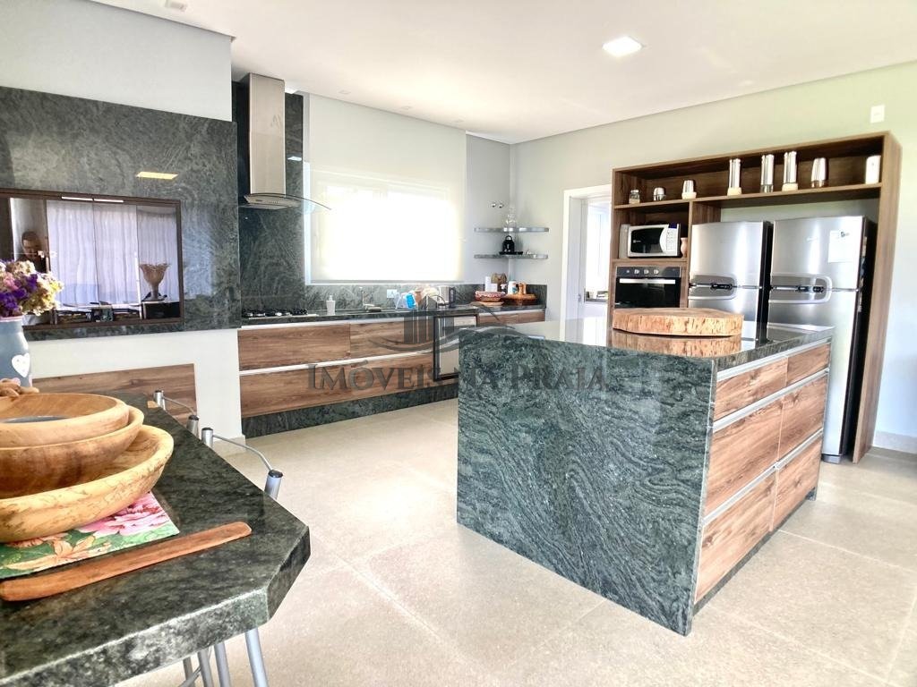 Foto 13 — Casa em Condomínio 4 dormitórios no bairro Villaggio Atlântida