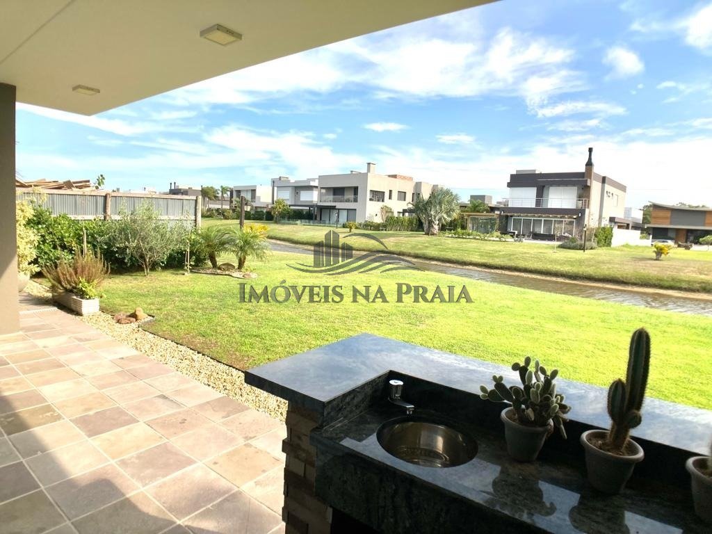 Foto 36 — Casa em Condomínio 4 dormitórios no bairro Villaggio Atlântida