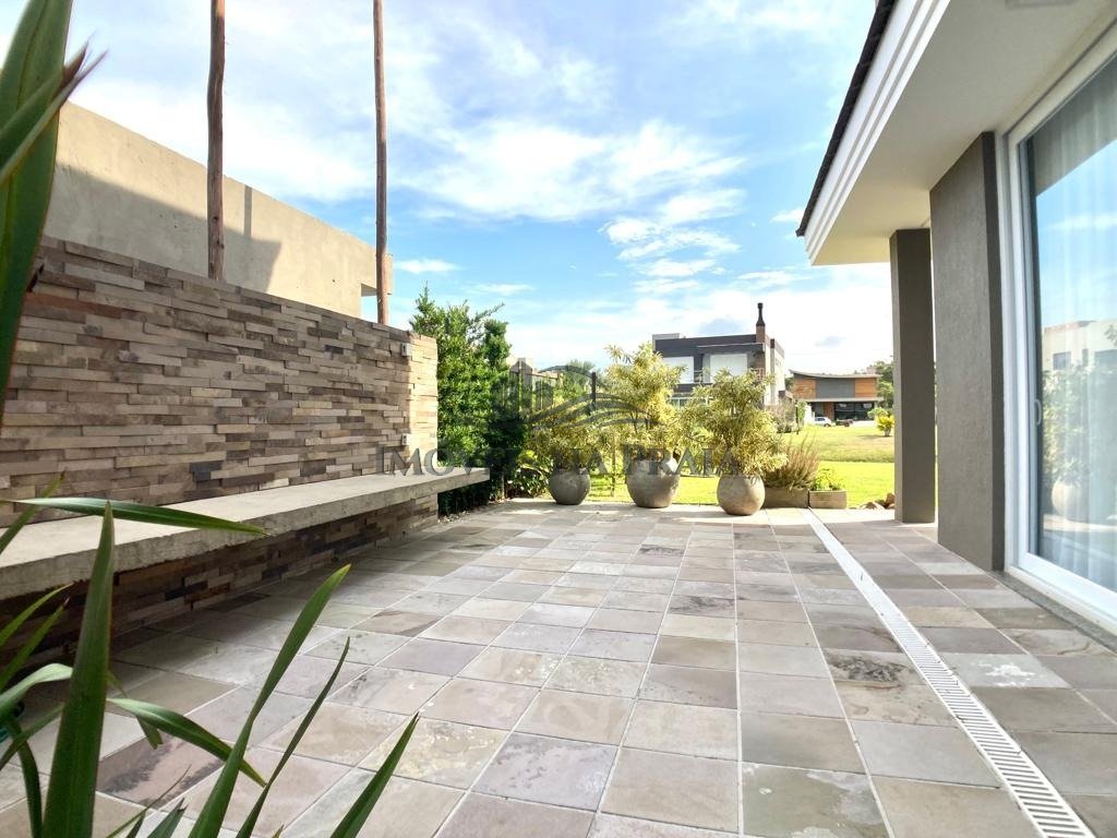 Foto 19 — Casa em Condomínio 4 dormitórios no bairro Villaggio Atlântida