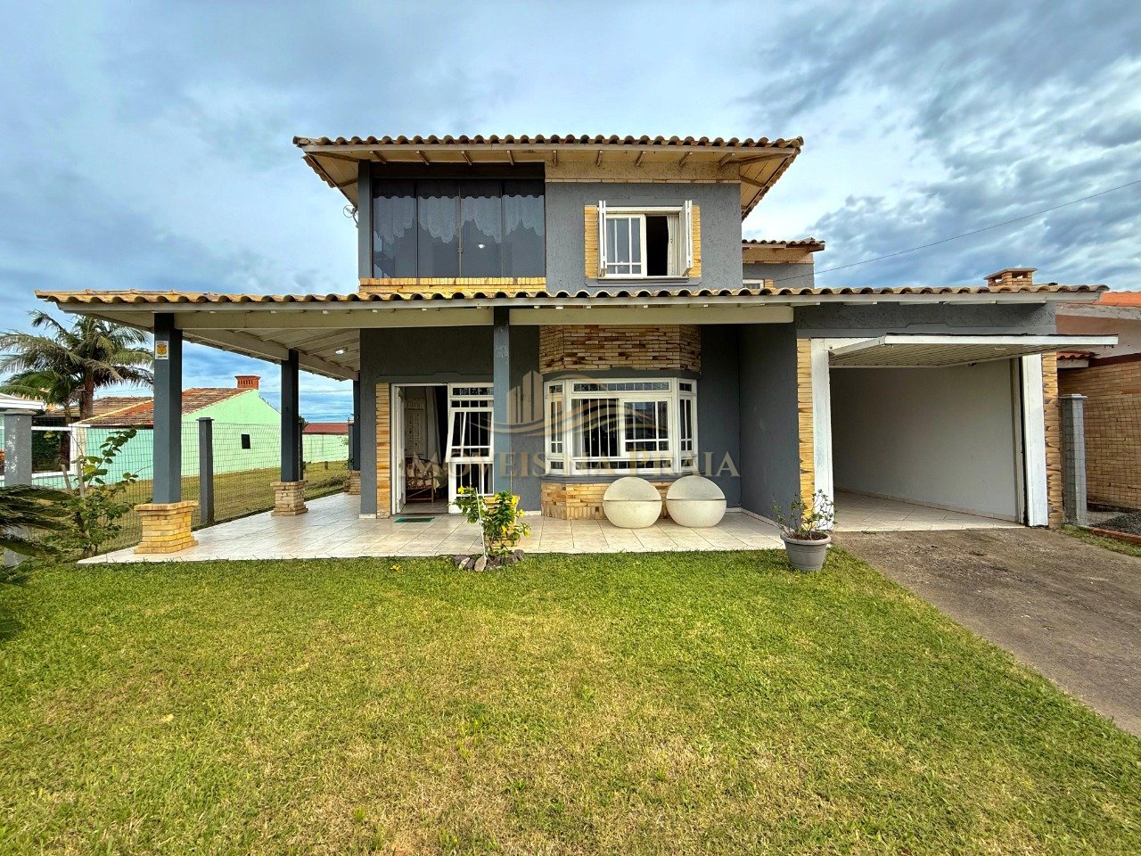 Casa 4 dormitórios no bairro Noiva do Mar