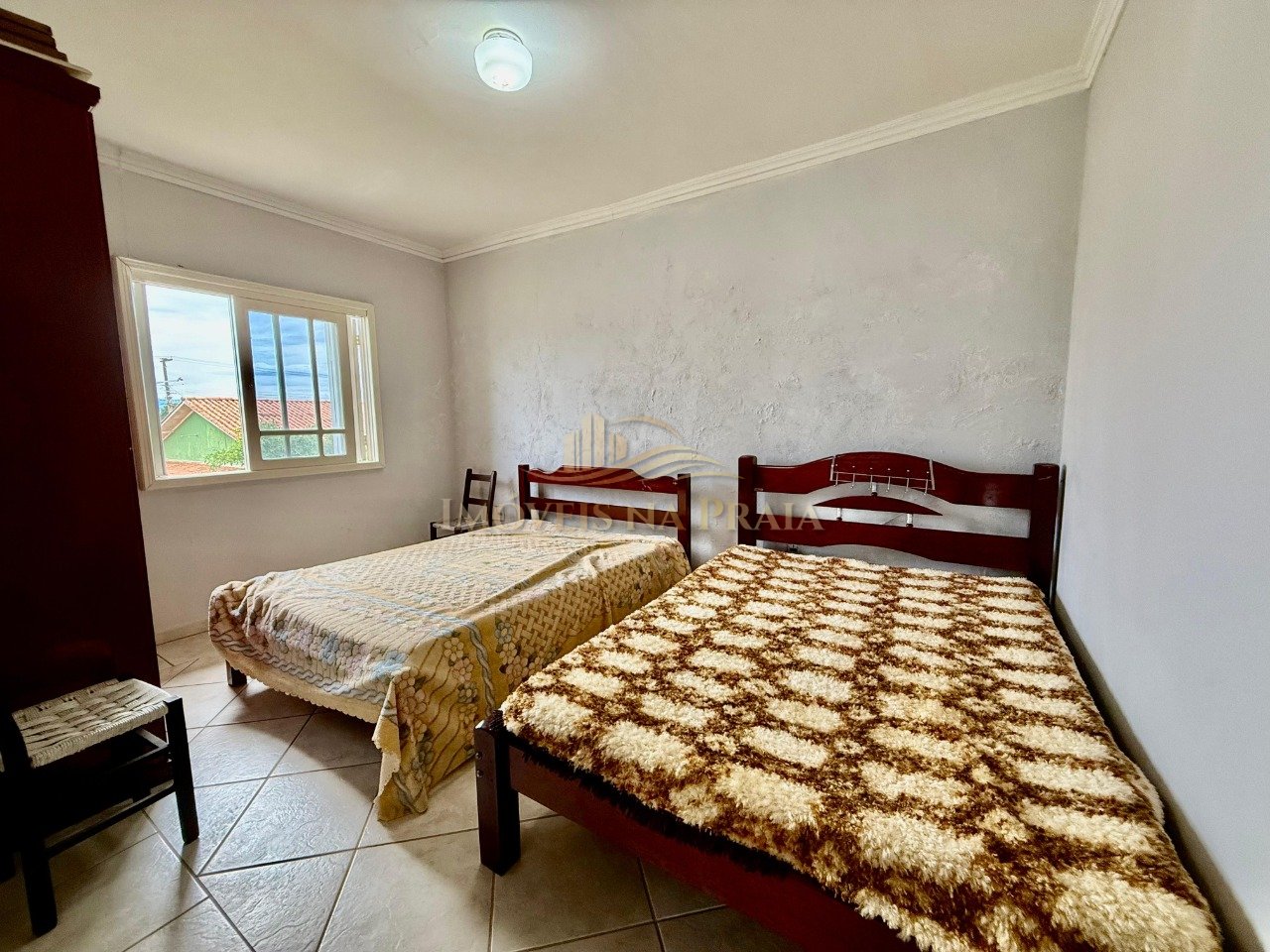 Foto 2 — Casa 4 dormitórios no bairro Noiva do Mar