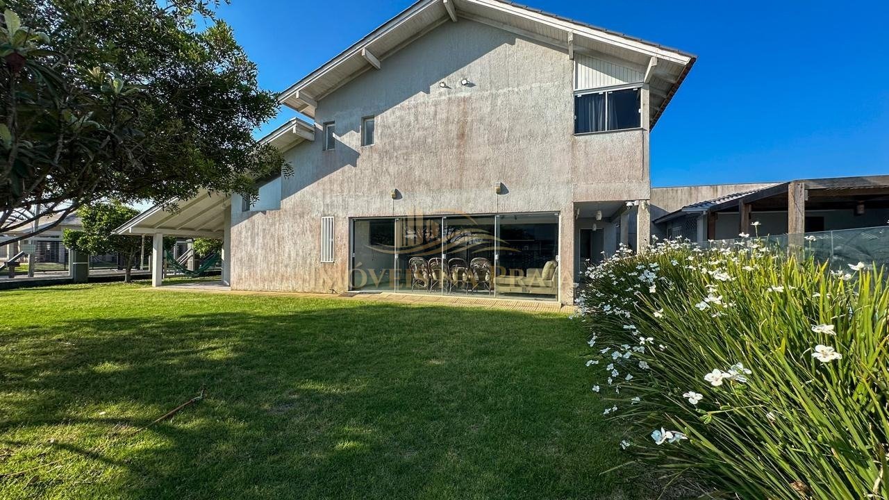 Foto 17 — Casa 4 dormitórios no bairro Rainha do Mar