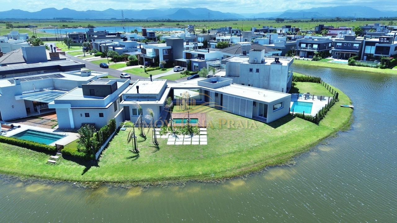 Foto 2 — Casa em Condomínio no Riviera Xangri-Lá.