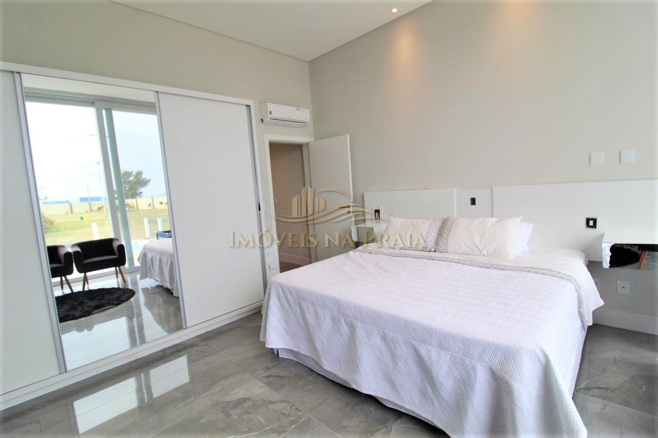 Foto 4 — Casa em Condomínio no Riviera Xangri-Lá.