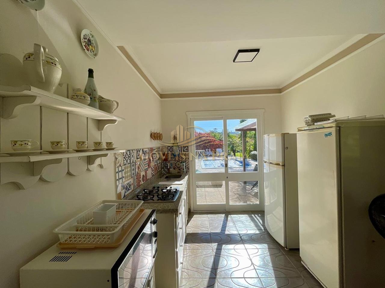 Foto 39 — Casa 4 dormitórios no bairro Atlântida