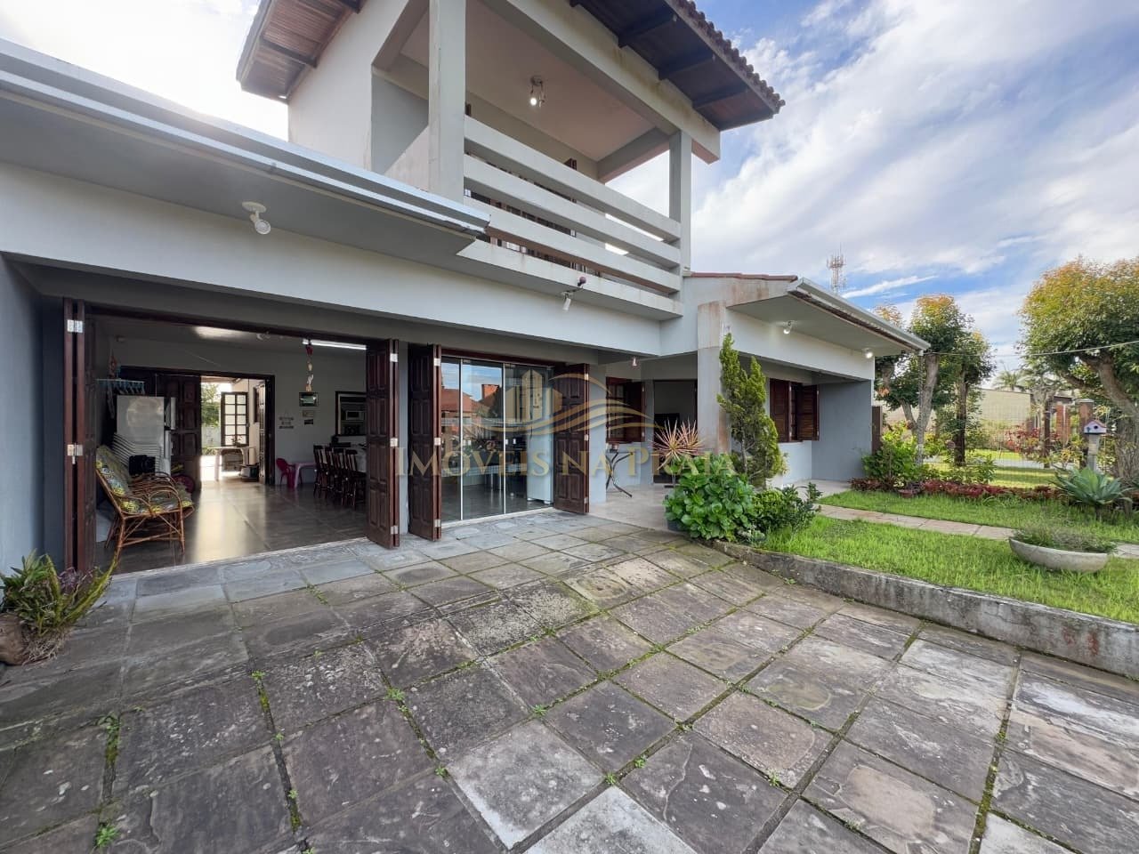 Foto 2 — Casa 5 dormitórios no bairro Rainha do Mar