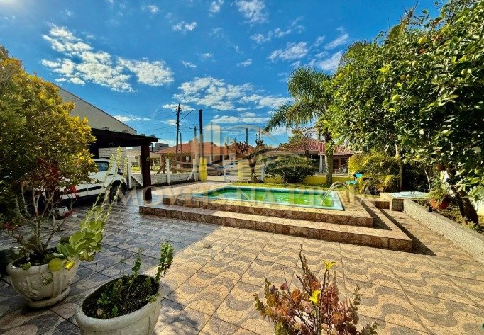 Foto 7 — Casa 4 dormitórios no bairro Noiva do Mar