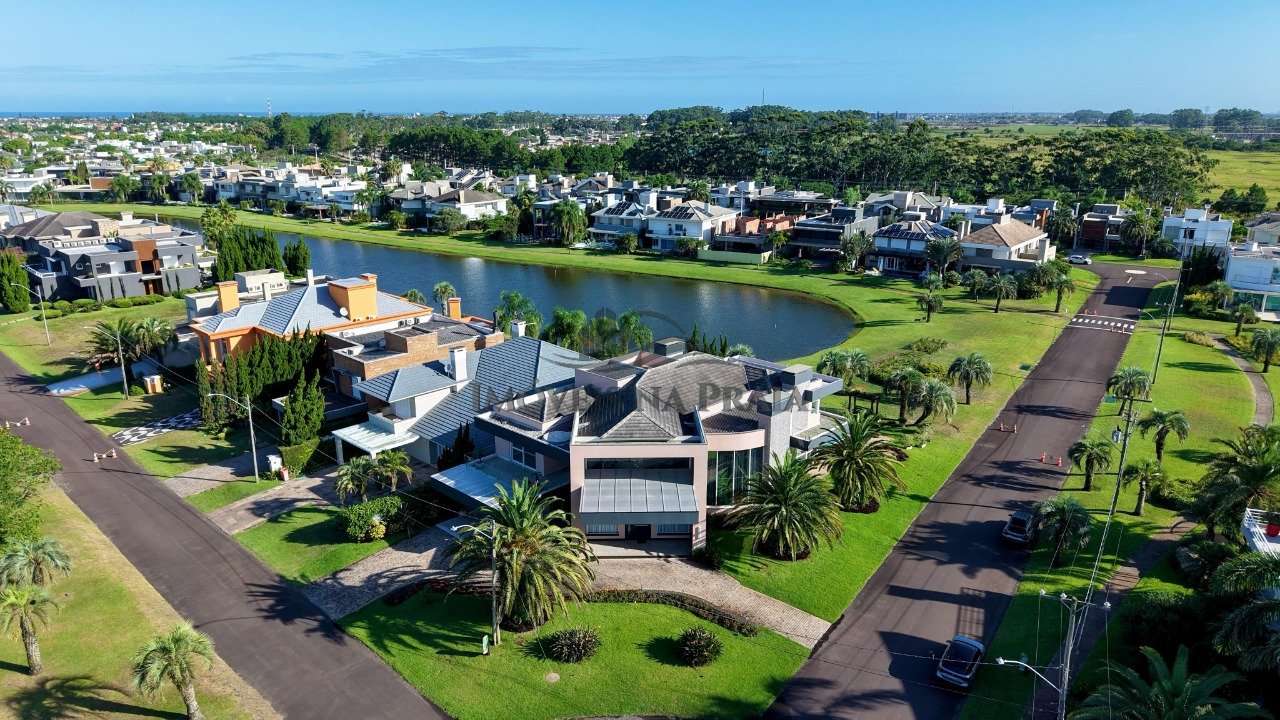 Foto 2 — Casa em Condomínio 5 dormitórios no bairro Bosques de Atlântida