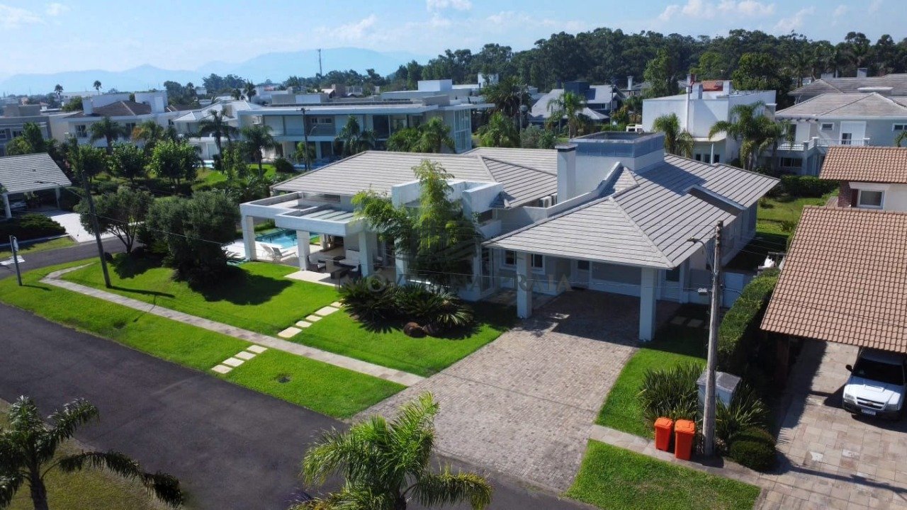 Casa em Condomínio 4 Dormitório(s) Bairro Atlântid