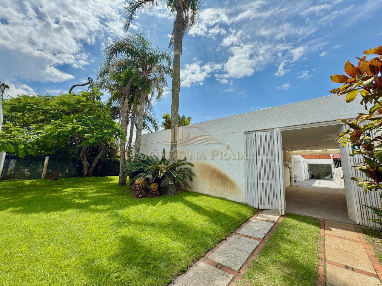 Foto 2 — Casa 4 dormitórios no bairro Atlântida