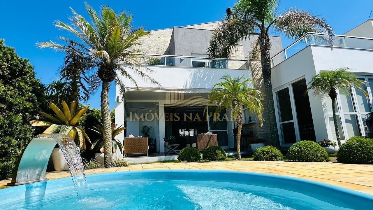 Foto 2 — Casa 4 dormitórios no bairro Rainha do Mar