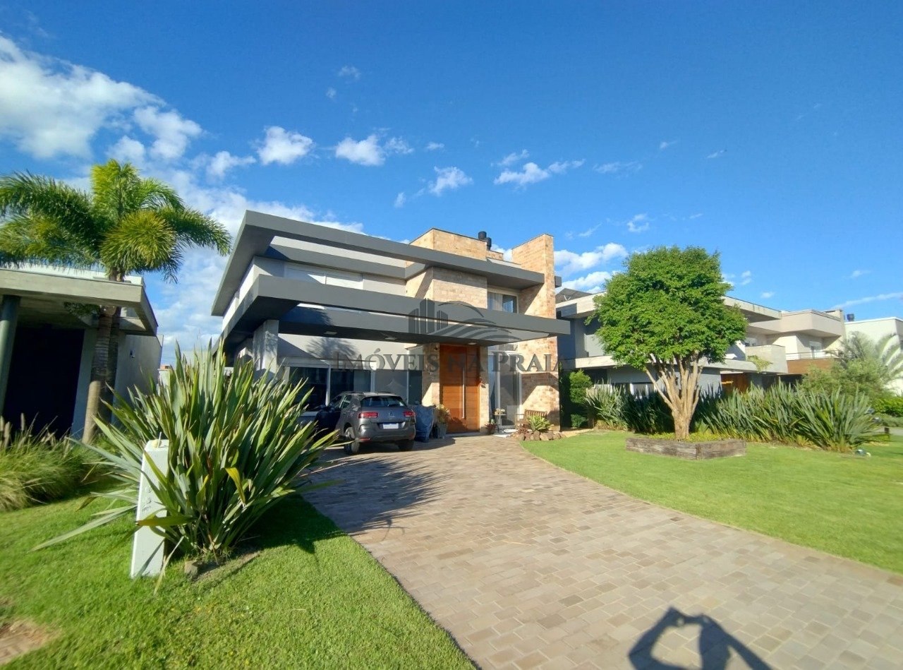 Foto 2 — Casa em Condomínio 4 dormitórios no bairro Villaggio Atlântida