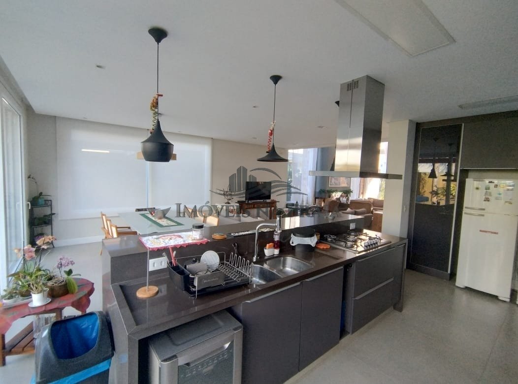 Foto 12 — Casa em Condomínio 4 dormitórios no bairro Villaggio Atlântida