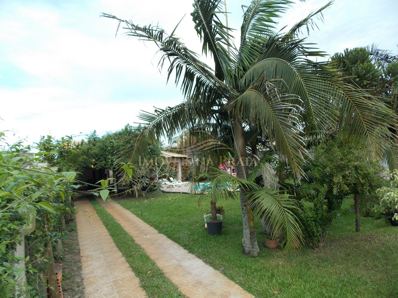 Foto 2 — Casa 4 dormitórios no bairro Atlântida