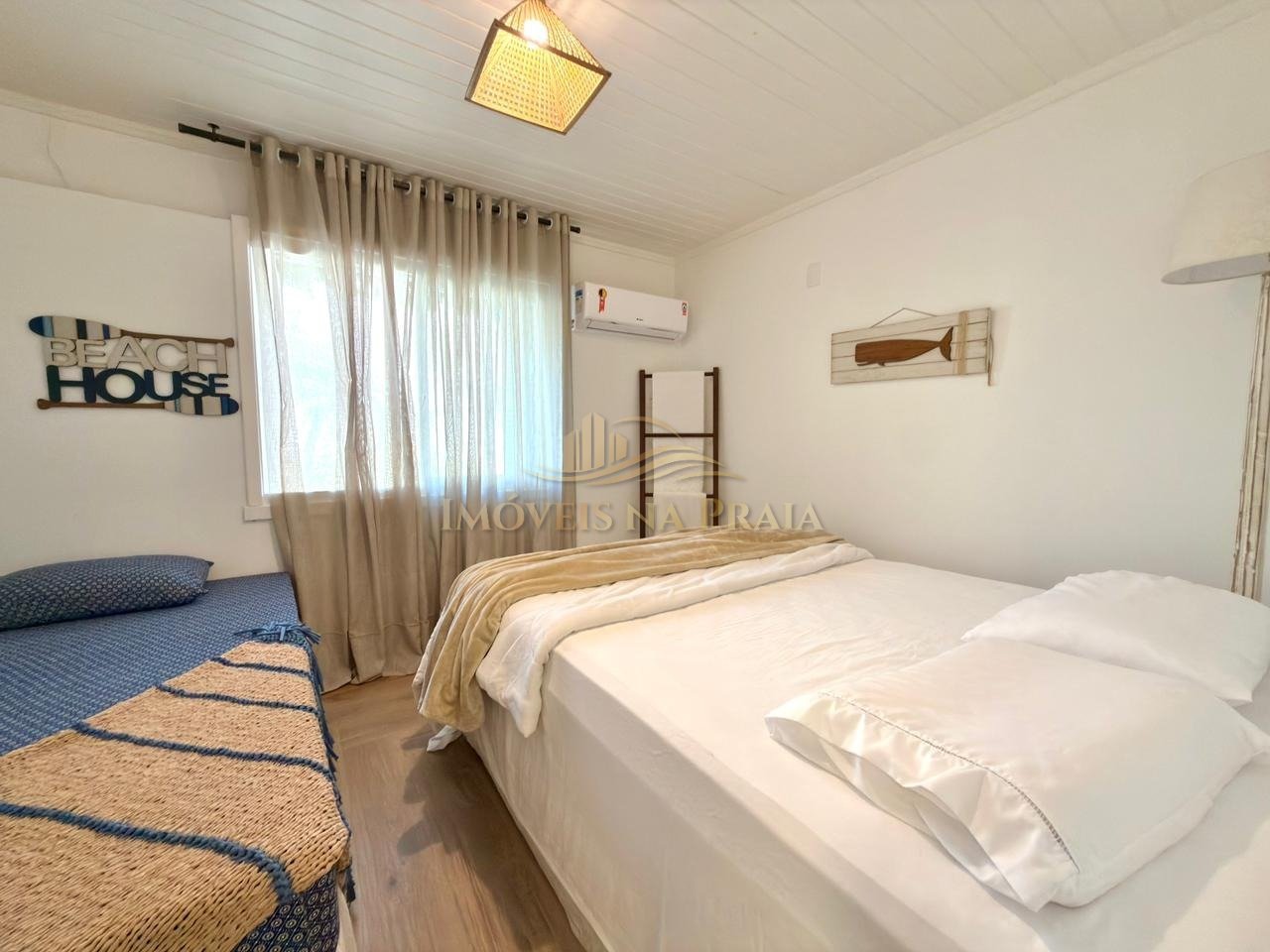 Foto 2 — Casa 5 dormitórios no bairro Atlântida